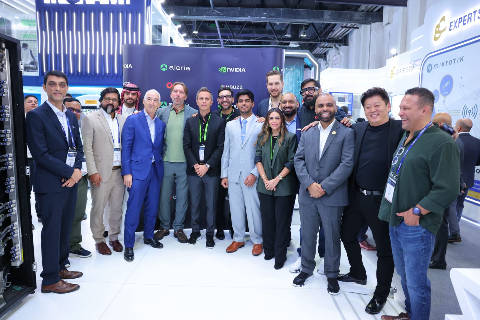 Jérôme Freani with the Aleria team and partners in front of the aleria, NVIDIA and MBUZZ backdrop at GITEX Global 2025 in Dubai