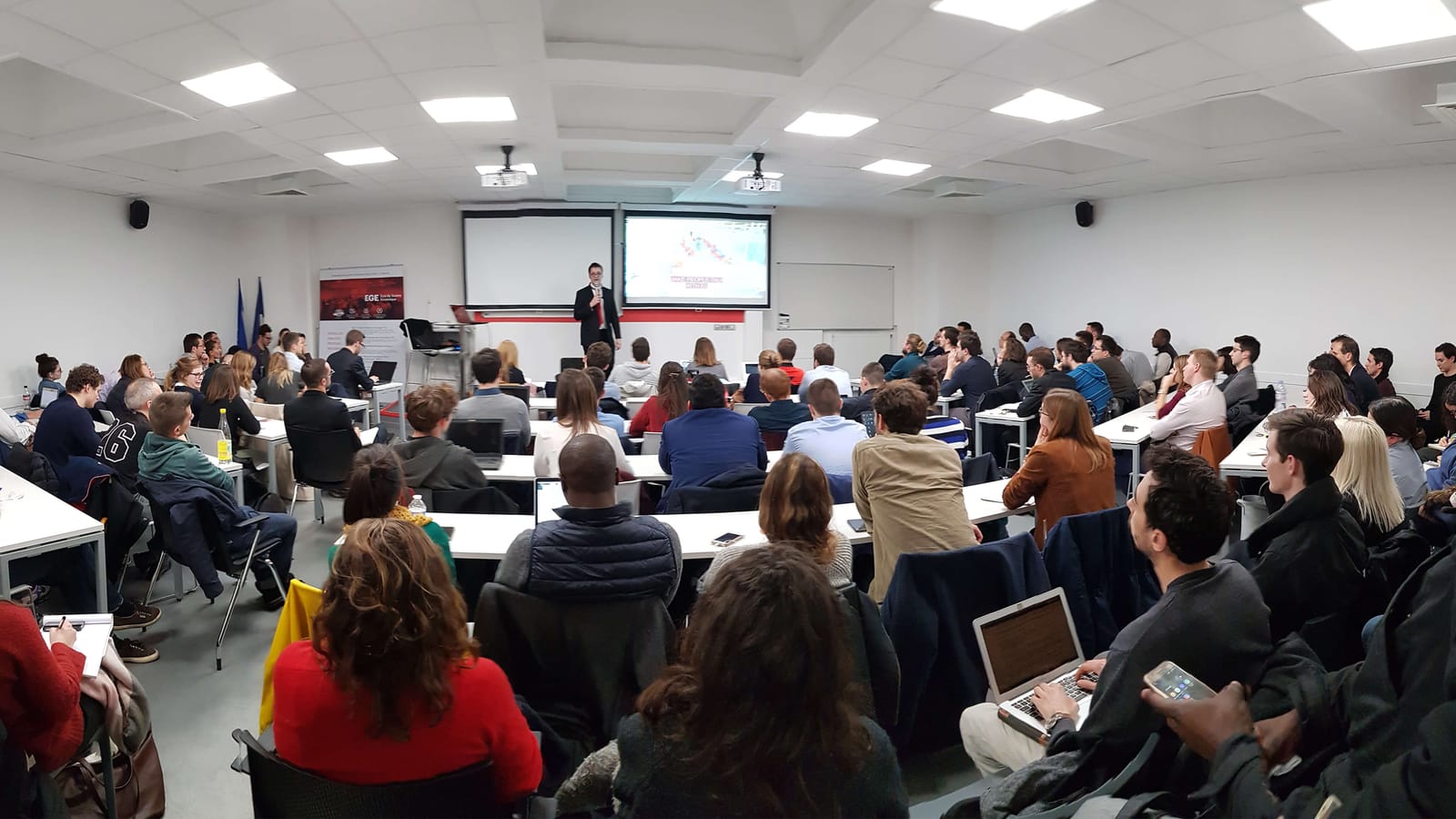 Audience at a Club Cyber AEGE conference with Teodor Chabin of Devoteam at the École de Guerre Économique